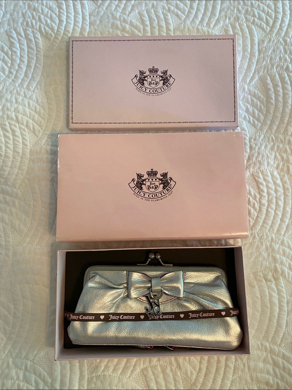 Juicy Couture Silver Metallic Bow Frame Wristlet Clutch